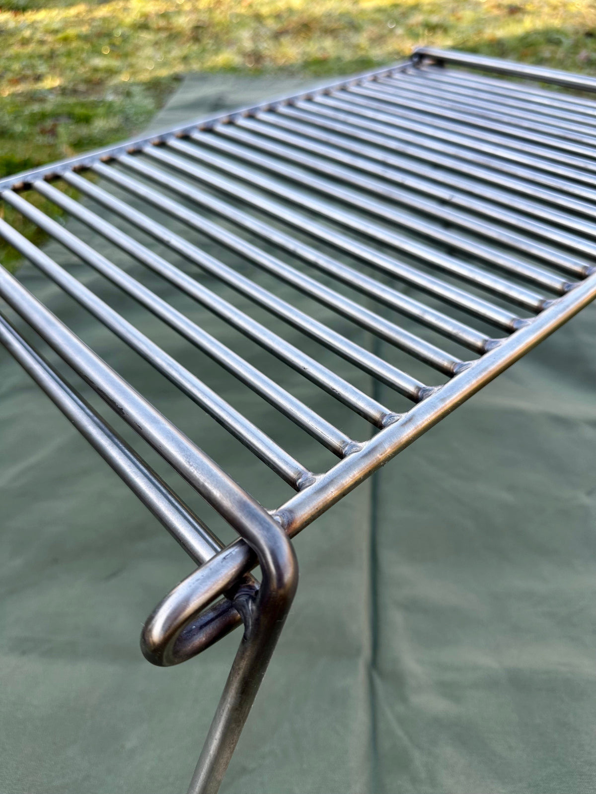 Folding Bushcraft and Camping BBQ Grill Can Cook upto 10 plus people. Compact and Portable. 