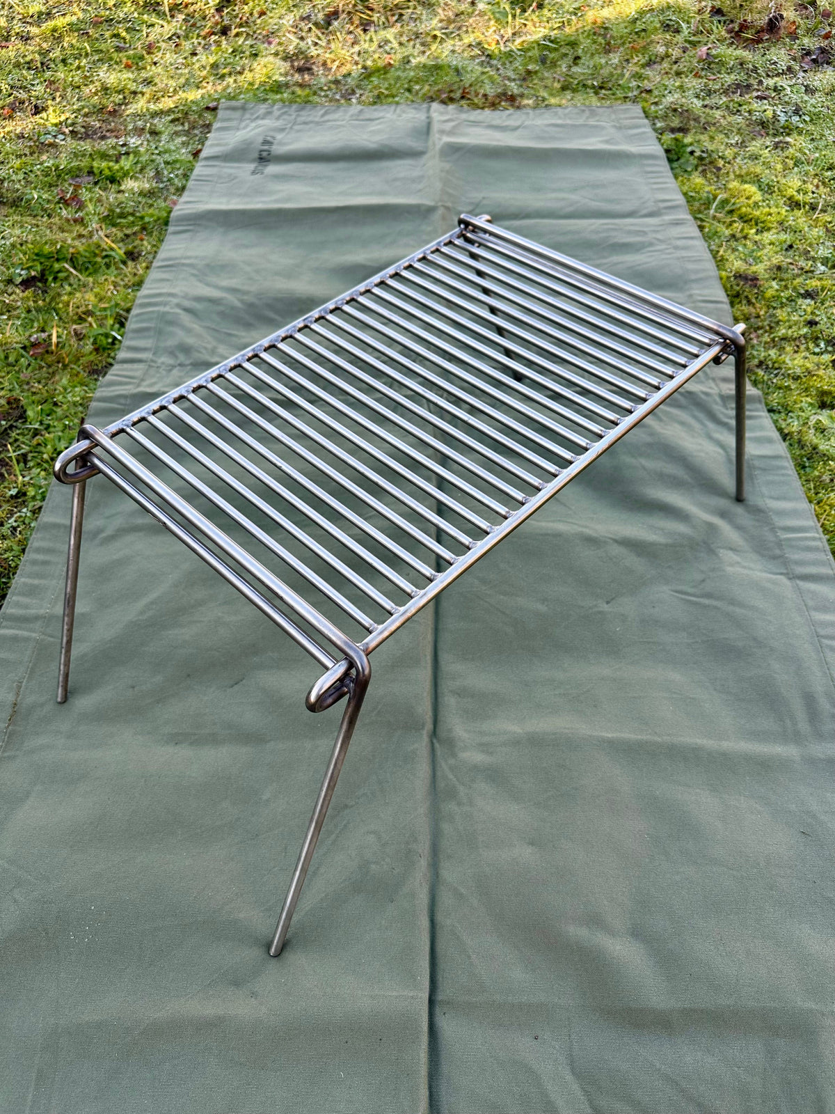 Folding Bushcraft and Camping BBQ Grill Can Cook upto 10 plus people 